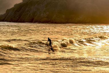 Surfing at Caswell