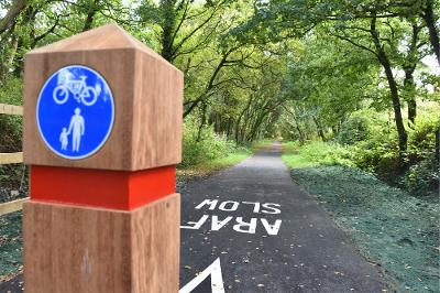 Shared use path (tree lined, with sign).